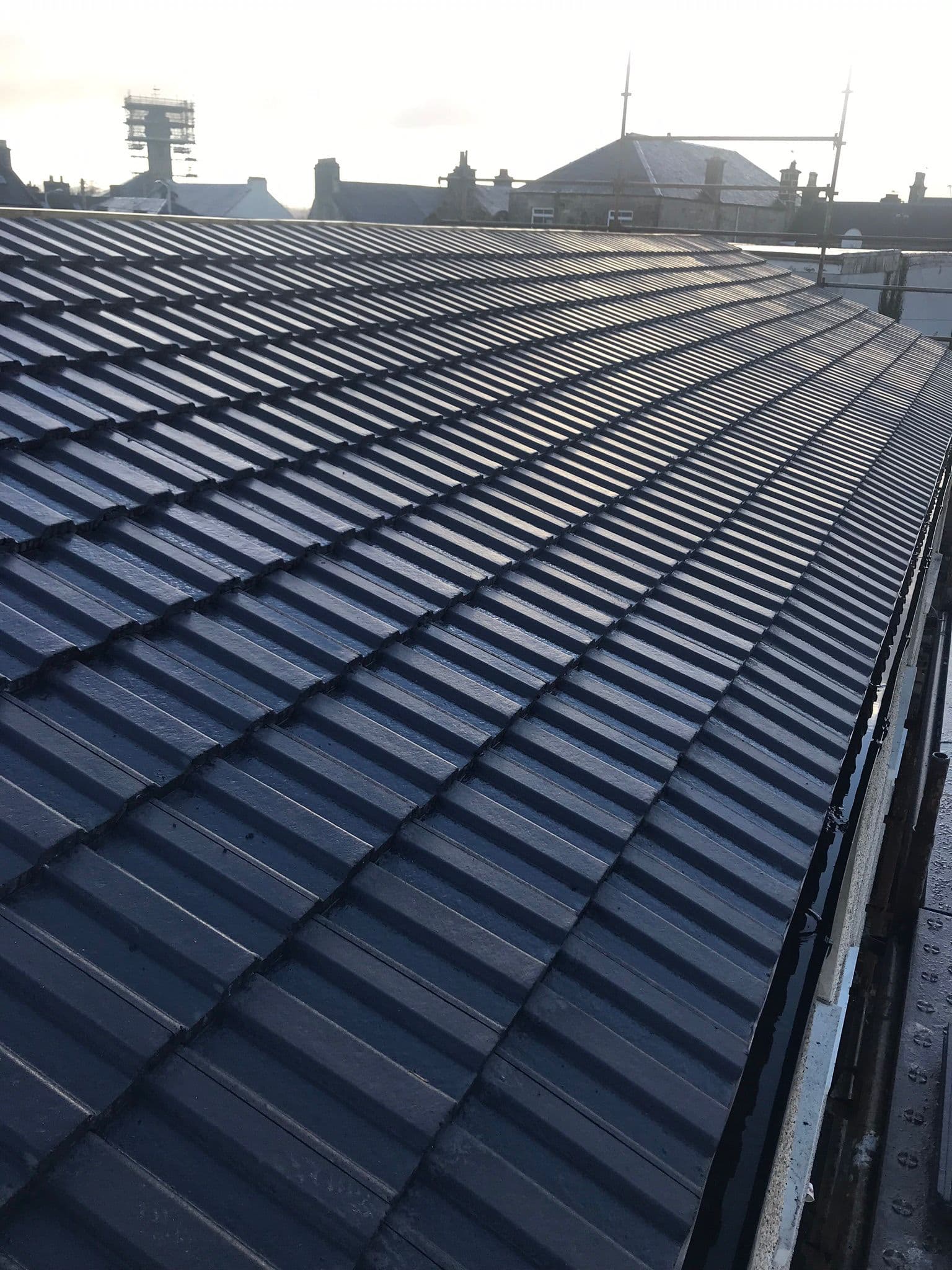 New tiled roof being professionally installed